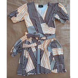 Burgundy peach white and black dress.